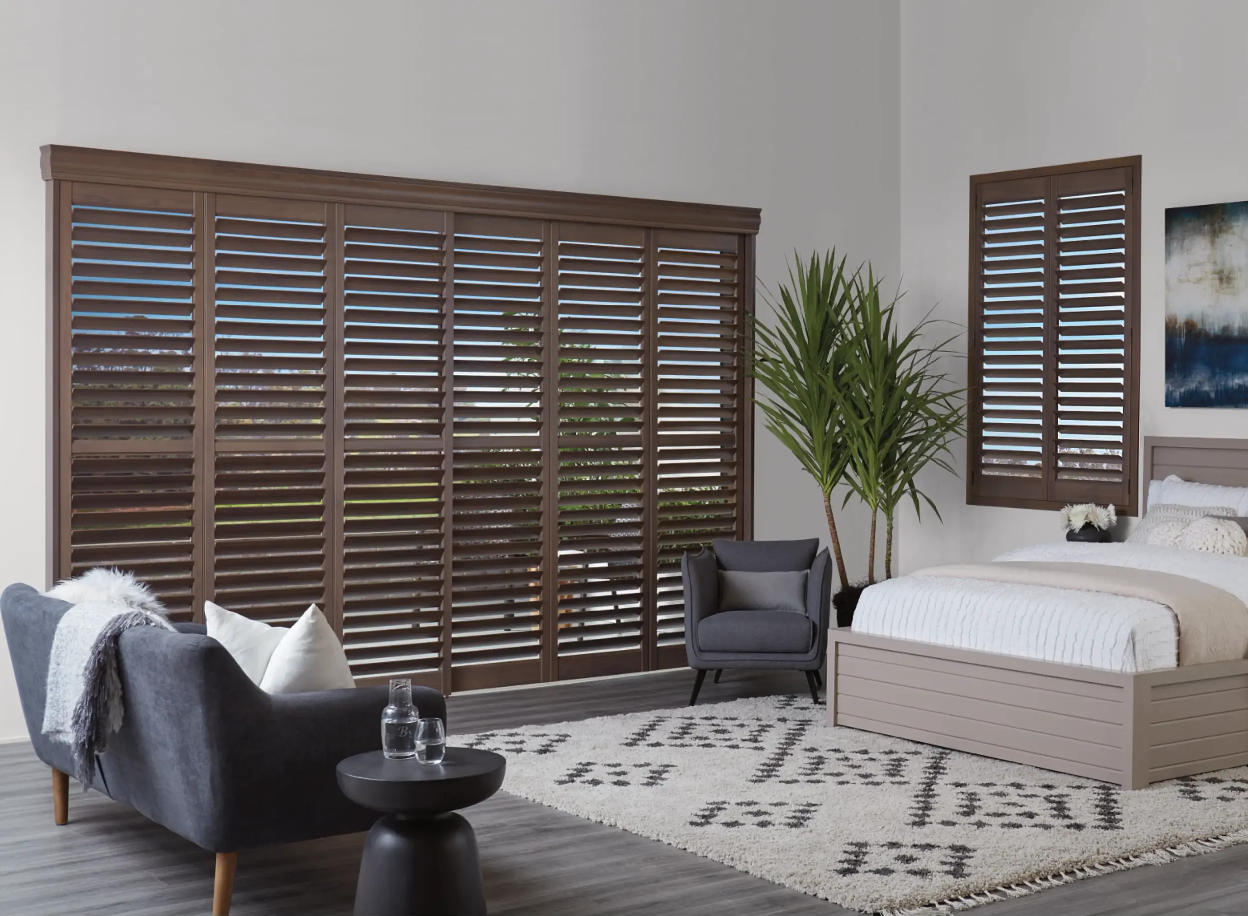 faux wood composite shutters in bedroom